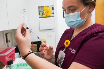 Iona College nursing student Anna Tesoriero ’21, of Huntington, N.Y., draws a COVID-19 vaccine. In all, students will vaccinate 550 residents over six sessions in New Rochelle, N.Y.