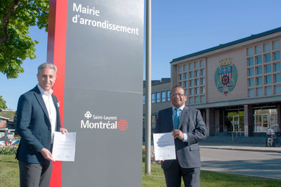 Frédéric Abergel, President & CEO of the CIUSSS NIM, and Alan DeSousa, Mayor of Saint-Laurent, in front of Saint-Laurent borough hall, holding the agreement entered into between the two organizations (CNW Group/Ville de Montréal - Arrondissement de Saint-Laurent)