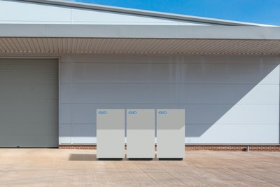 Three Exro 25kW 150kWh Energy Storage Systems outside a small facility. (CNW Group/Exro Technologies Inc.)