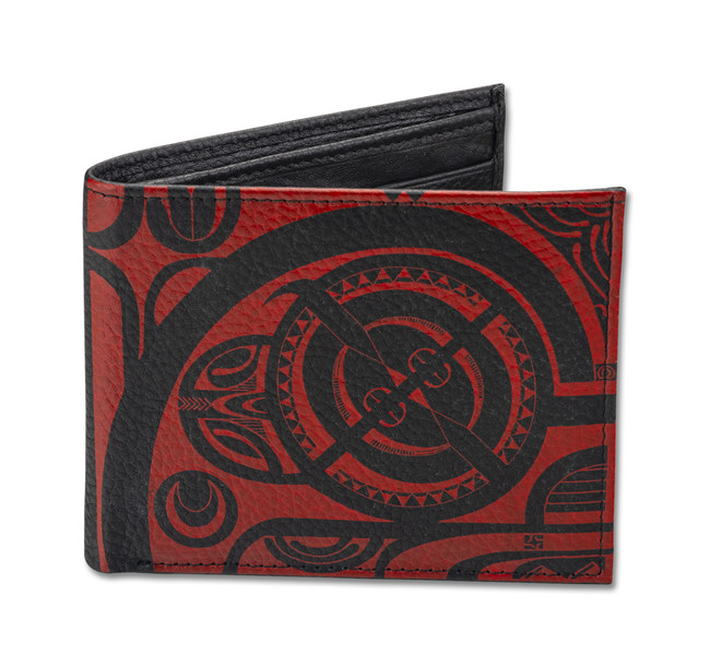 Tattoo artist Che Pilago draws on his Hawaiian, Marquesas, and Tahitian heritage in this tribal tattoo design for a bifold wallet by NA KOA Leather. The overall design is primarily in a very modernized the French Polynesian style, with some traditional motifs like tiki eyes and the enata pattern to signify a tiki. Che's tattoo wants to inspire the wallet's owner to look and move forward in life.