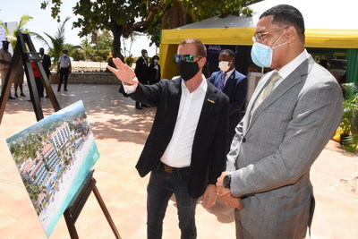 Sandals Resorts International's Executive Chairman, Adam Stewart, CD, and Prime Minister, The Most Hon. Andrew Holness, ON, MP, surveying plans for the future Sandals Dunn's River and Sandals Royal Dunn's River resorts.