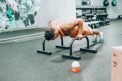 Athlete working out with the BODbx AI training device