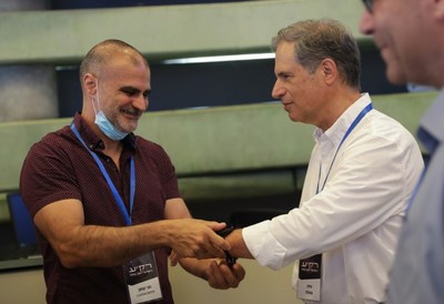 Meni Itzhak, CardiacSense VP R&D, with Eytan Stibbe, Israeli second astronaut. Credit: Elad Malka