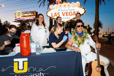 Touro University Nevada, home of the state’s largest medical school and only school of osteopathic medicine, hosted a pop-up COVID-19 vaccination clinic at the world-famous “Welcome to Las Vegas” sign on Monday, May 24. Coined “Vaccines after Dark,” and co-hosted by Clark County Commissioners Justin Jones and Michael Naft, along with US Rep. Dina Titus, the pop-up event drew nearly 100 people who received vaccinations administered by Touro School of Physician Assistant Studies students, includin