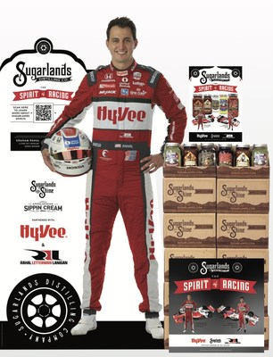 Hy-Vee point of sale material featuring Graham Rahal and Takuma Sato.