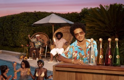 Bruno Mars poses beside the SelvaRey lineup: SelvaRey White Rum, Chocolate, Owner's Reserve and the newly launched Coconut.