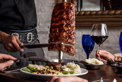 At Texas de Brazil, gauchos carve perfectly seasoned cuts of beef, lamb, pork, chicken and Brazilian sausage at the guest's table. The meat is cooked over a wood charcoal fire, the same way the cowboys of Southern Brazil have prepared it for generations. (PRNewsfoto/Texas de Brazil)