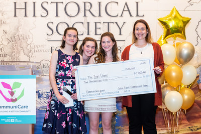 Student Grant makers distributing checks to nonprofits at the 2019 Grant Award Ceremony.