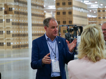 Nolan Pike, CEO of Electrolux North America, and Springfield, Tenn.  Mayor Ann Schneider greets employees at Electrolux's newly expanded Springfield warehouse, the first segment of the more than $250 million factory expansion at its Springfield campus.