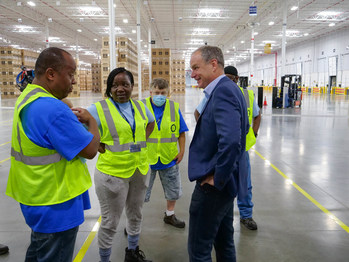 Nolan Pike, CEO of Electrolux North America, welcomes employees to Electrolux's newly expanded Springfield warehouse, the first segment of the more than $250 million factory expansion at its Springfield campus.
