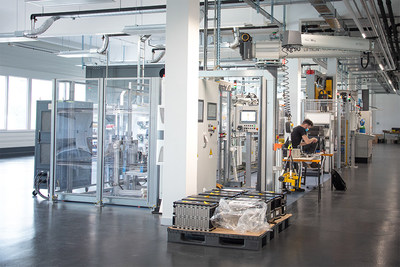 Leclanch's new module assembly line in Yverdon, Switzerland. The foreground shows the end of line tester that ensures the battery module's quality and safety.