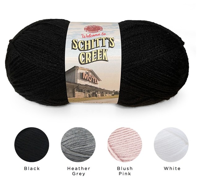 Lion Brand's line of "Schitt's Creek" products will include varying styles and colors of yarn-including white, heather grey, blush, and, of course, jet black-all of which will bear an exclusive "Schitt's Creek" label.