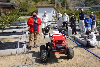 XAG R150 Unmanned Ground Vehicle on its roadshow to spray mandarin oranges