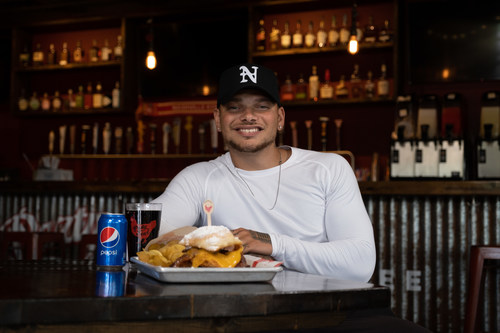 The winner of the "Summer Better with Pepsi" sweepstakes will get to meet Kane Brown and receive tickets for them and 20 friends to attend one of his “Blessed and Free” concert tour stops, complete with a spread of his namesake chicken sandwich – Kane Brown's Nashville Hot Royale, as seen on Guy’s Restaurant Reboot.