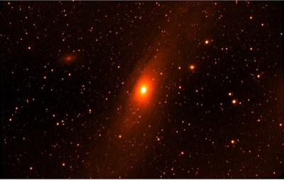 Composite false-color image of the Andromeda galaxy created by stacking 12 Medium FOV channel images for a total exposure of 19.2 seconds. This image demonstrates the exceptional stability obtained by the Tyvak-0130 satellite.