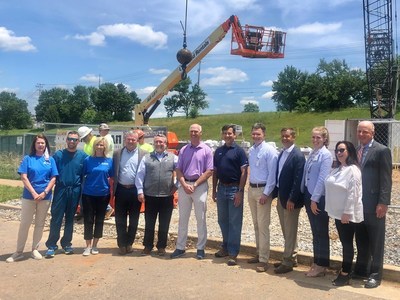 Leaders from Realty Trust Group (RTG), University of Tennessee Medical Center, University Orthopaedic Surgeons, and OrthoTennessee are celebrating the “topping off” of the Advanced Orthopaedic Institute.