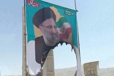 Torn Ebrahim Raisi campaign poster in Iranian 2021 presidential election.