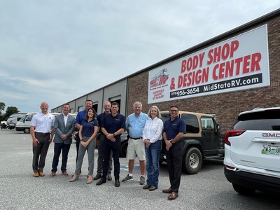 Mid State RV in Byron, GA with prior owner Mr. Lee Pickard, Don Strollo, East Region President and Jon Ferrando, President and CEO of RV Retailer and accompanying executive team