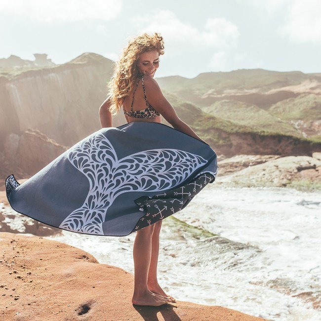 Evolve's sustainable, sand free towel with the Mirissa print.