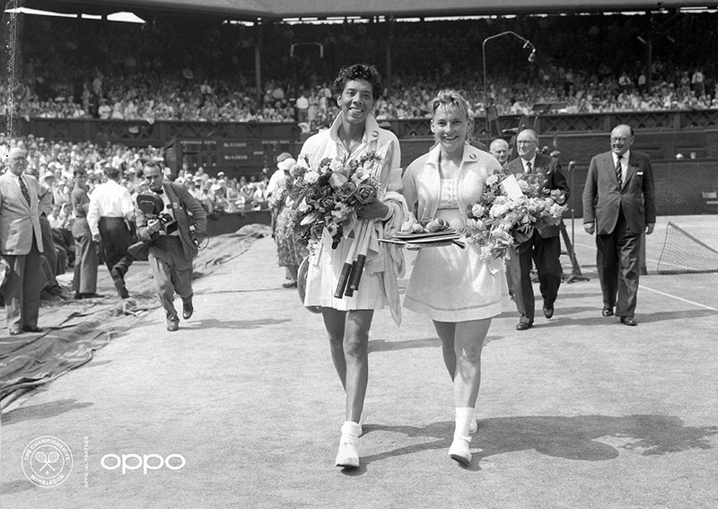 Althea Gibson (Photo: AELTC) 
The first African American woman to win Wimbledon, Althea Gibson is pictured in full colour, leaving the court with her compatriot Darlene Hard after a hard-fought battle. Using one billion colours, the image, originally in black and white, brings new life to a true icon and leader, who never accepted no as an answer in life and was constantly striving to show she deserved her place on the court, regardless of her skin tone. 

The image is one of seven in OPPO’s Courting the Colour campaign, launched today to celebrate the return of Wimbledon.  https://events.oppo.com/en/oppo-and-tennis/#awakencolour