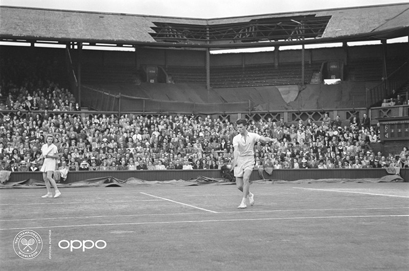 Wimbledon, post WWII (Photo: AELTC) 
1946 was the first time Wimbledon took place after World War II. In the background, you can still see the damage of the Blitz, even more clearly having been reimagined using one billion colours, as part of OPPO’s Courting the Colour campaign.  

The image, recoloured with experts from Getty Images, is one of seven, launched today to celebrate the return of Wimbledon, the collection illuminates and restores the emotion of iconic moments from tennis history, bringing the excitement and passion back to the sport. View the collection, here: https://events.oppo.com/en/oppo-and-tennis/#awakencolour