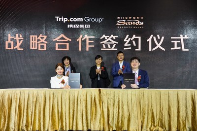 Jane Sun, CEO, Trip.com Group (left), and Grant Chum, COO, Sands China Ltd. (right), sign a strategic partnership agreement during the event, with Maria Helena de Senna Fernandes, Director, Macao Government Tourism Office (centre) overseeing