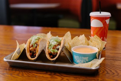 The Frank’s RedHot® Buffalo Queso Taco is a hard shell taco wrapped in a soft tortilla with buffalo queso in between.