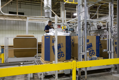A worker packages polymer at Ascend's Pensacola plant. The plant is the largest integrated polyamide 66 production facility in the world and was recently recognized by GM with a Quality Supplier Award