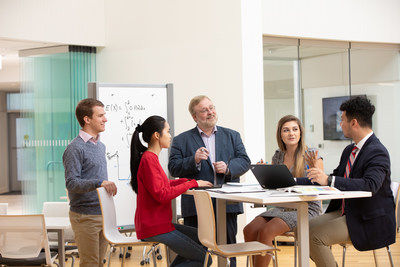 "This grant, and the accompanying research, represents a chance for Bryant University to solidify and enhance its position as a leader in STEM recruitment and education," says Rick Gorvett, Ph.D. (center), Professor and Chair of the Mathematics department, and a principal investigator for the grant and research.