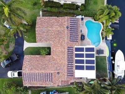 Patented ArteZanos® Hybrid System with various ArteZanos® Flexible Solar Modules over ArteZanos®  Solar Thermal R.I.S.A. (Roof Integrated Solar Absorber). Photo: Courtesy of Chris Porosky of All Phase Construction U.S.A., LLC Deerfield Beach, Florida.