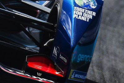 The Not Impossible Bento logo (lower right) on an Envision Virgin Racing all-electric race car. Genpact leveraged its partnership with Envision Virgin Racing to include the logo, raising awareness in the fight against food insecurity.