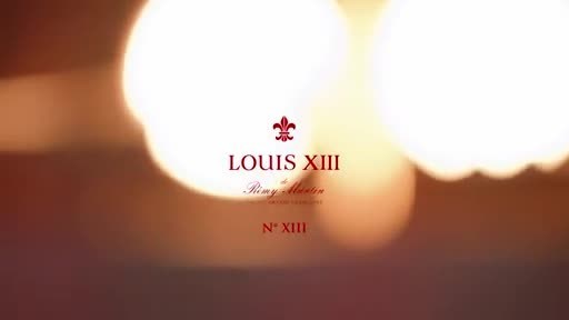 LOUIS XIII has collaborated with Saint-Louis, the oldest glass manufacturer in Europe, to create the striking handmade N°XIII red decanter and red cognac glasses. The vibrant red hue of the glass can only be achieved using a secret process that requires the addition of gold. Saint-Louis’ shared passion for tradition, savoir‐faire and innovation comes to life in the rare decanters: blown, cut, decorated and engraved by hand, and individually numbered, it is finished with the LOUIS XIII signature dentelle spikes and a palladium neck
