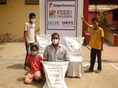 Feed the Children, Teleperformance and HOPE Worldwide distributing food to families in India for COVID-19 relief.