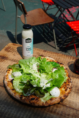 Razza’s Pizza Insalata: Razza’s wood-fired pizza crust is topped with Gotham Greens salad greens and seasonal vegetables tossed in Gotham Greens Vegan Ranch dressing.