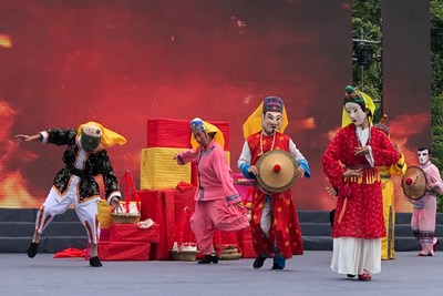 Photo shows the performance of Nuoxi, a kind of drama included in "Feitao", a national intangible cultural heritage of Maonan ethnic group.