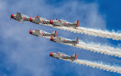 The GEICO Skytypers Air Show Team flies six WWII-era vintage aircraft for air show performances.