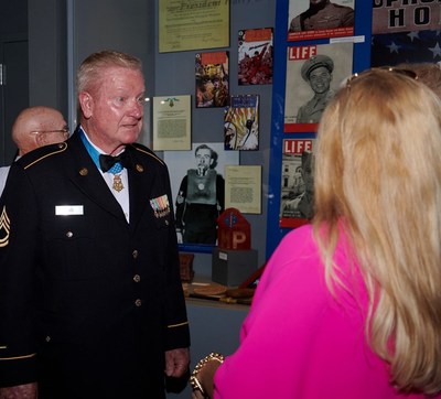 Medal of Honor Recipients from around the country visited the Congressional Medal of Honor Museum and Congressional Medal of Honor Society offices headquartered on board the U.S.S. Yorktown in Mount Pleasant, S.C. on July 14, 2021. Above, retired U.S. Army Sgt. 1st Class Sammy L. Davis stands beside an exhibit at the museum. Photo Credit: event photo group/CMOHS
