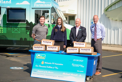Left to right: Jonathan Toms, Smithfield Foods Charitable Initiatives Manager, Ellie Wanek, Nebraska FFA President, Brian Barks, President and CEO for Food Bank for the Heartland, Craig Todd, Omaha District Store Manager for Hy-Vee.