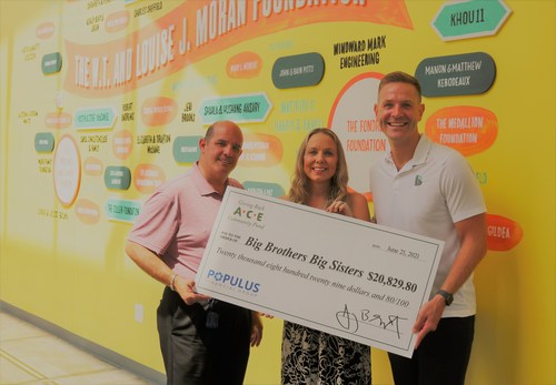 ACE Cash Express associates present a $20,829 donation to Alex Dailey, VP of Community Engagement at Big Brothers Big Sisters Greater Houston