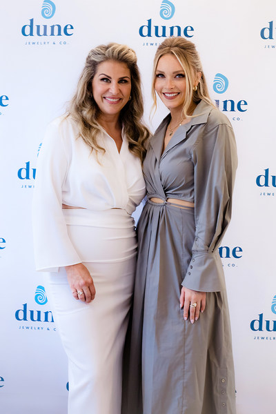 Dune Jewelry & Co. Founder & CEO, Holly Daniels Christensen & TV host, actress and model, Camille Kostek. Camille was the celebrity guest at the grand opening of Dune's first-ever branded boutique. Fans lined up around the block to meet Camille and view her designs. Over the past 6 years Camille has worked with Holly to bring her jewelry visions to life. Beginning with the Voyager Collection in 2016, there is also the Camille Collection, the Moonstone Collection and the Cosmos Collection.
