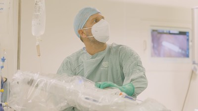 Salomón Zebede, M.D., a urogynecology and reconstructive pelvic surgeon and member of the robotic department at Pacifica Salud Hospital in Panama, gets ready to perform one of the first gynecologic procedures with the Hugo™ robotic-assisted surgery system.