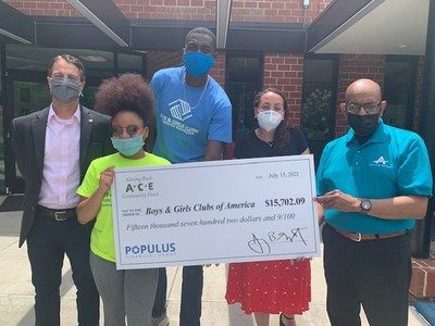 ACE Cash Express associate presents a $15,702 donation to James Woodward, Senior Director of Development, Calvin Dascent, Clubhouse 14 Branch Director and Marya Kawmy, Director of Corporate Giving at Boys & Girls Clubs of Greater Washington