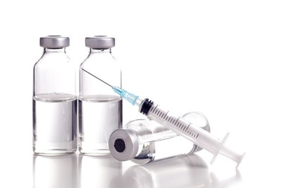 Photo shows syringe with vials