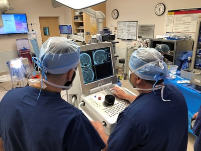 Xoran xCAT IQ in use during neurosurgical clinical research. The study is designed to examine benefits associated with easily obtained CT imaging of the head at the point of care, instead of transporting the critical patient to a conventional scanner.