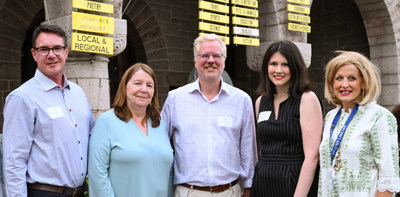 Butler Tibbetts' Robert Becker, Tim Butler, and Meredith McBride celebrate with Dr. Beth Beaudin and Caroline Crawford of the Pequot Library at the recent Preview Party for the 61st Annual Summer Book Sale, one of the largest book sales in New England.