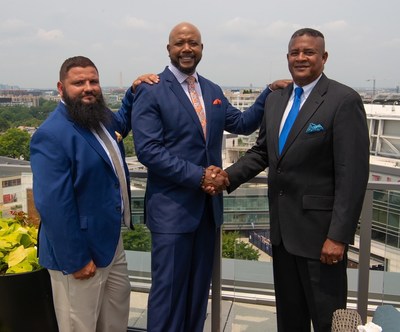 James Villa and Omar Demmis of Sedulous Consulting with Lindo Bradley of Infinity Support Services (photo by Nancy Kleck).