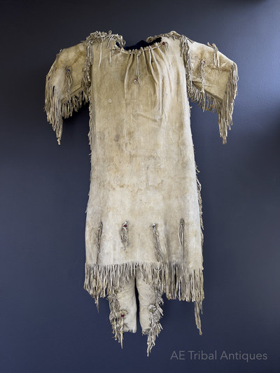 This Lakota Girl's hide dress, originally part of the JH Sharp Collection, is on offer from AE Tribal at the Antique American Indian Art Show Santa Fe.