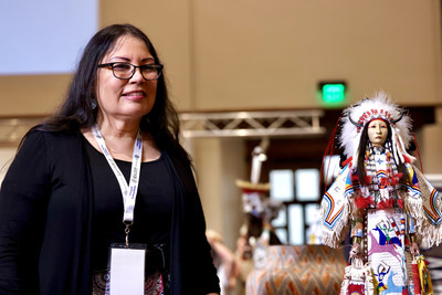 Best of Show Winner Rhonda Holy Bear Bear (Cheyenne River Sioux) and her winning Doll, Lakota Honor- Sees the Horses Woman. photo©Tira Howard for SWAIA/ Santa Fe Indian Market