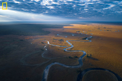Aerial view of the Cuando River. The Okavango Wilderness Project's 2018 expedition focused on the eastern-most section of their survey area in Angola. The trek took the team down the length of the Cuando River, a journey that allowed them to explore the intersection of the Okavango and Zambezi Basins, two of the largest basins in Southern Africa. Photo by Kostadin Luchansky / National Geographic Okavango Wilderness Project.