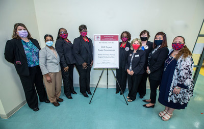 From left to right: Doris Thornhill, DNP Candidate; Sara Bashyam, DNP Candidate; Tracie Barber, DNP Candidate; Carol Anderson, DNP Candidate; Dianna Moorer, DNP Candidate; Dr. Melanie Michael, Director of the Graduate Nursing Program; Dr. Tracy Magee, Assistant Professor of Pediatric Nursing and Education Coordinator; Kristen Milinazzo, DNP Candidate; Elizabeth Palazzi-Xirinaches, DNP Candidate.
